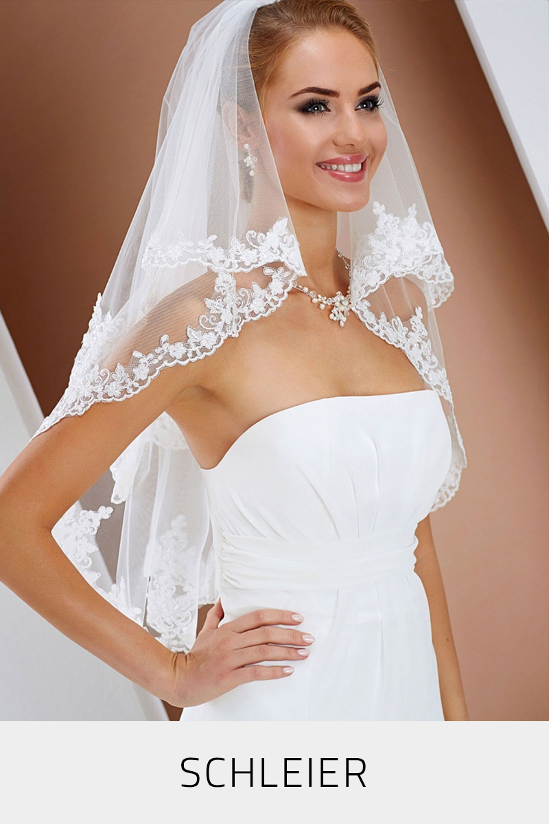 Zur Kategorie Brautschleier Eine Frau mit einem kurzen Spitzen-Schleier, elfenbeinfarben