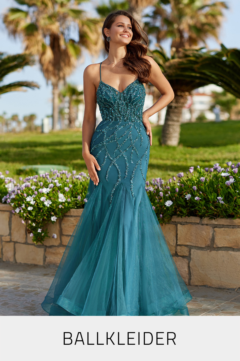 Zur Kategorie Ballkleider Eine Frau in einem Meerjungfrauen-Ballkleid in der Farbe grün
